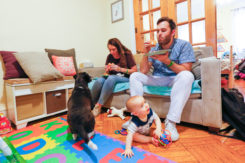 Jenna and Kyle eating while Artie and Scout compete for attention.